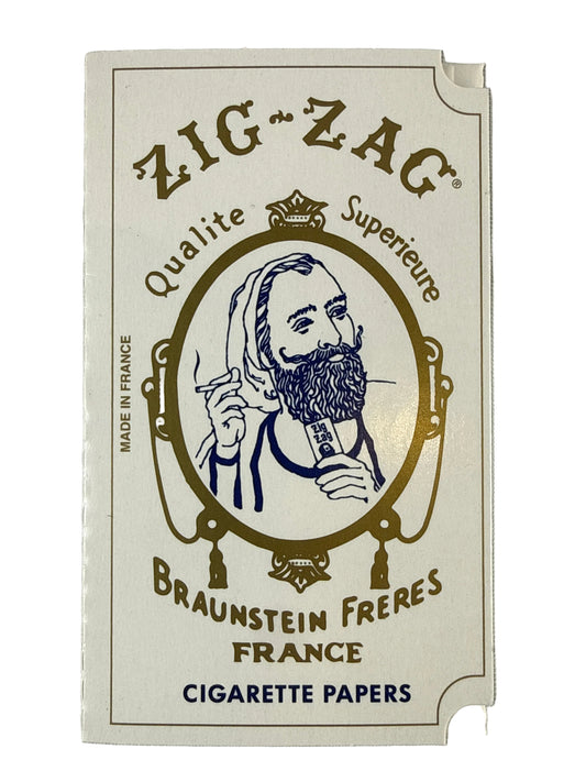 Zig-Zag cigarette paper packaging on a white background 